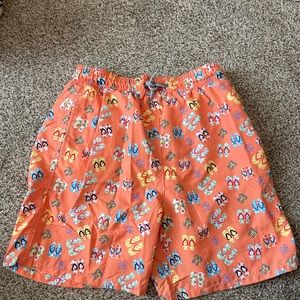 Michael’s Brand Boys Swim Trunks, Size -Large, Orange with colored Flip Flops.